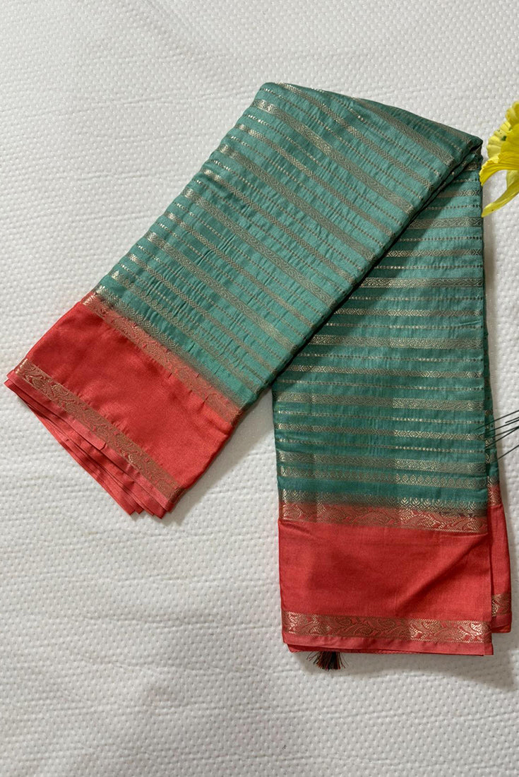 Dola Silk Saree with Gap Border in Teal